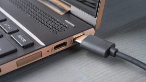 Closeup,Of,Usb,Type,C,Grey,Cable,Being,Connected,To
